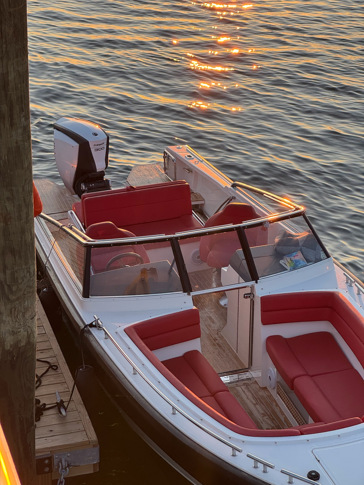 Draco overhead at golden hour showing red leather interior